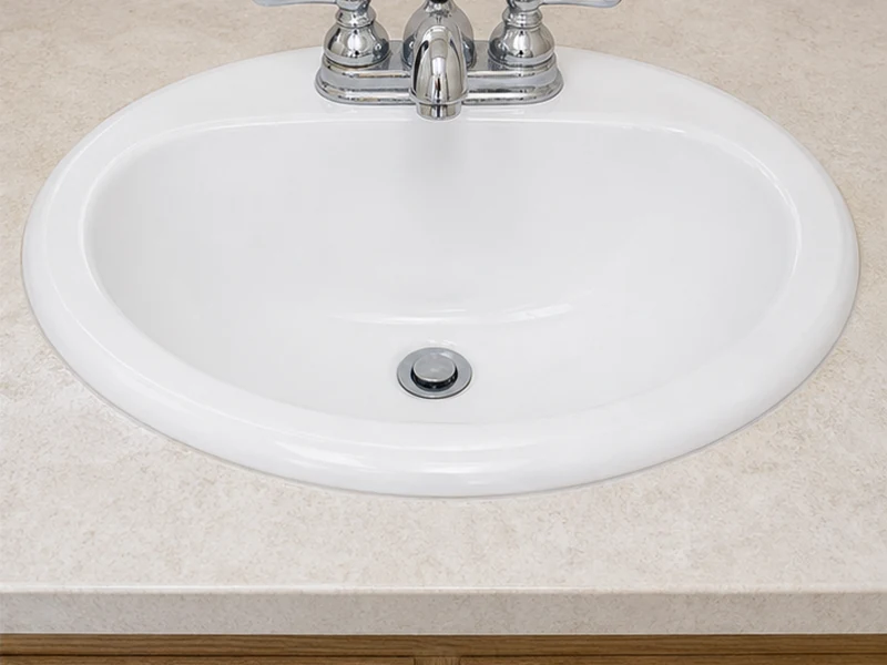 Same Irvington porcelain sink refinished glossy white after reglazing, Fremont
